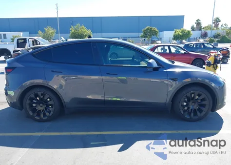 2023 Tesla Model Y Awd/Long Range Dual Motor All-Wheel Drive из США, поврежденный, VIN 7SAYGAEE3PF756915
